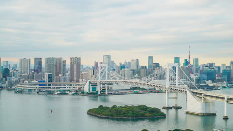 timelapse rainbow bridge with tokyo tower, japan.