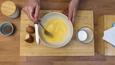 mixing eggs with milk