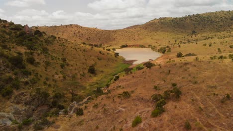 Flying-towards-a-lake-near-Laikipia,-Northern-Kenya