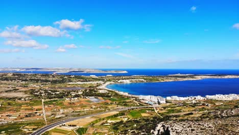 hyperlapse drone video from malta, mellieha area, flying to mellieha bay