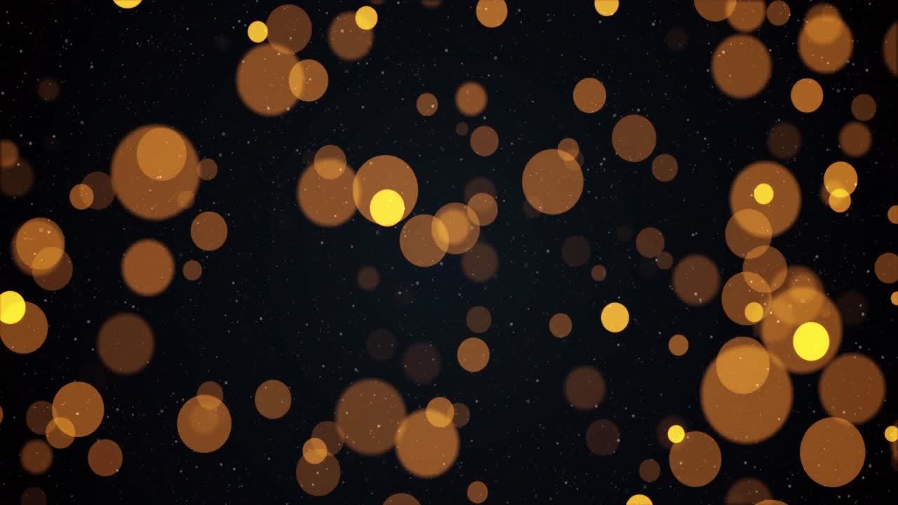 animación de cálidas manchas amarillas y naranjas brillantes sobre fondo negro