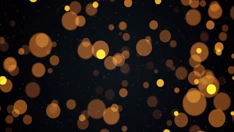 animation of warm glowing yellow and orange spots on black background