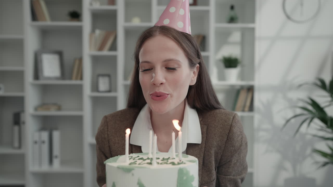 Woman celebrating birthday in the office