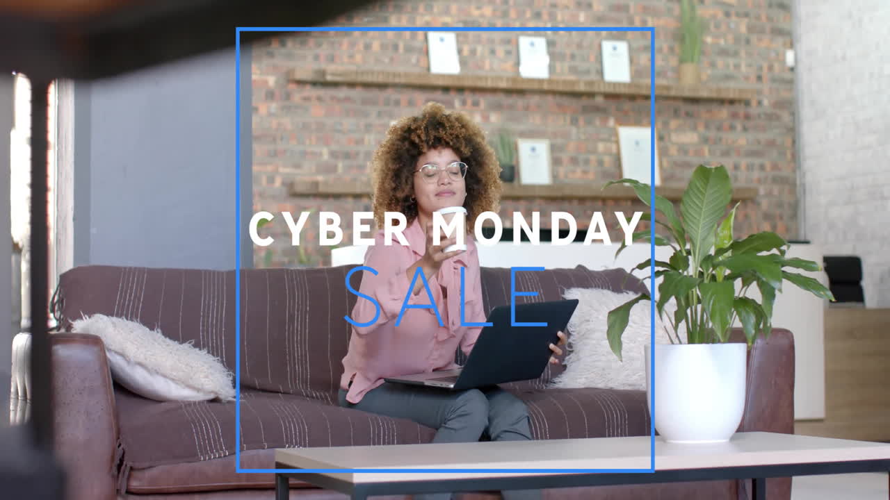 Animation of cyber monday sale text over biracial businesswoman drinking coffee