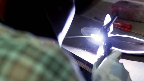 welder working in workshop 4k