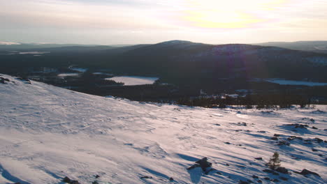 Cinematic-aerial-shot-reversing-over-a-mountainside