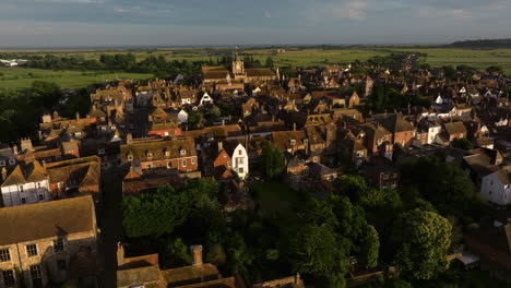 rye town and civil parish during sunset overlooking the river brede in east sussex, uk. - aerial shot