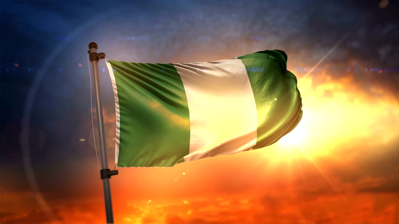 bandera de nigeria retroiluminada en el hermoso amanecer bucle cámara lenta 4k