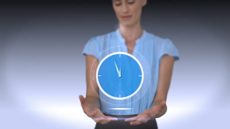 Businesswoman-holding-virtual-alarm-clock