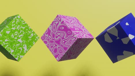 cajas multicolores animadas que se mueven sobre un fondo verde. animación 3d de bucle sin costuras abstracto moderno