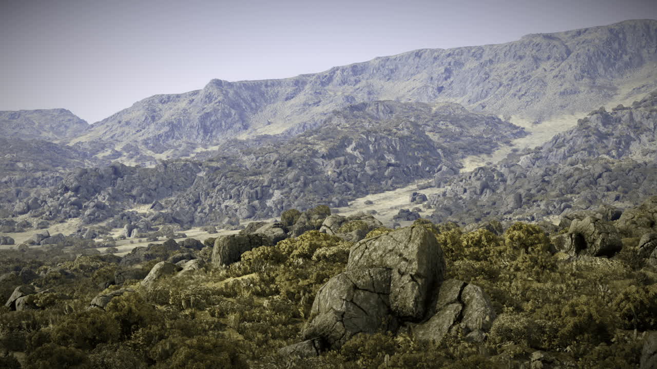 Terreno roccioso delle Highlands sotto un cielo terso durante le prime luci del mattino