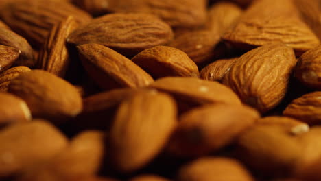 close up shot of almond nuts revolving on turntable shot in slow motion