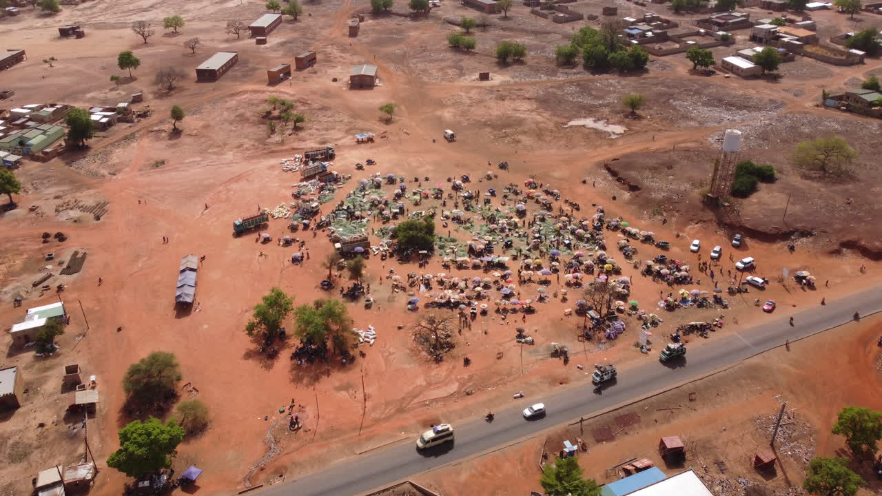 Premium stock video - Aerial video of a market area where people shop
