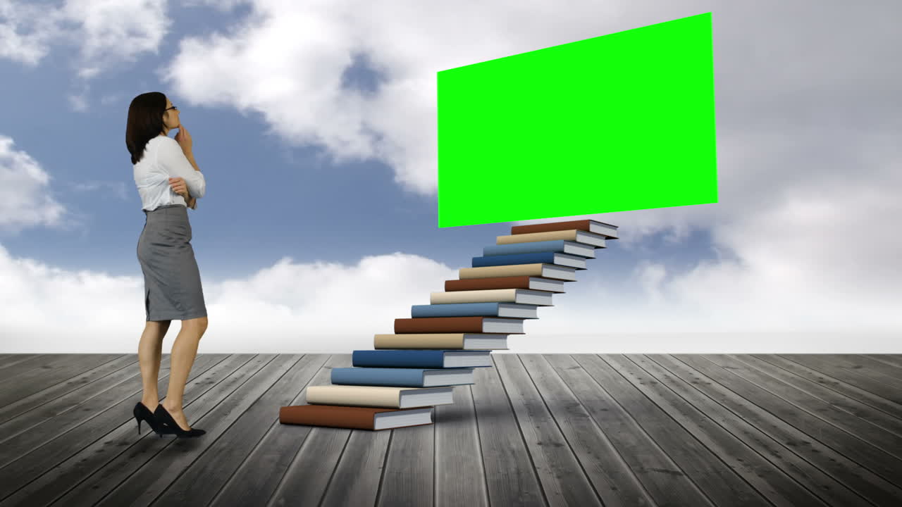 나무 땅 에 초록색 스크린 을 보고 있는 사업가