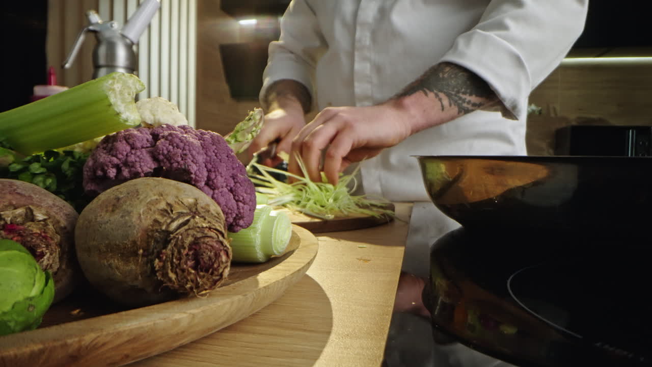 Chef preparing vegetables in the kitchen