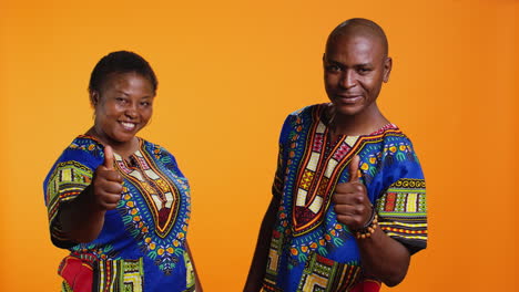 african american partners giving thumbs up gesture