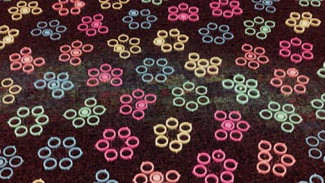 floral abstract background with children small flowers formed by neon colorful circles, seamless loop. animation. art kaleidoscopic pattern with round shapes forming figures