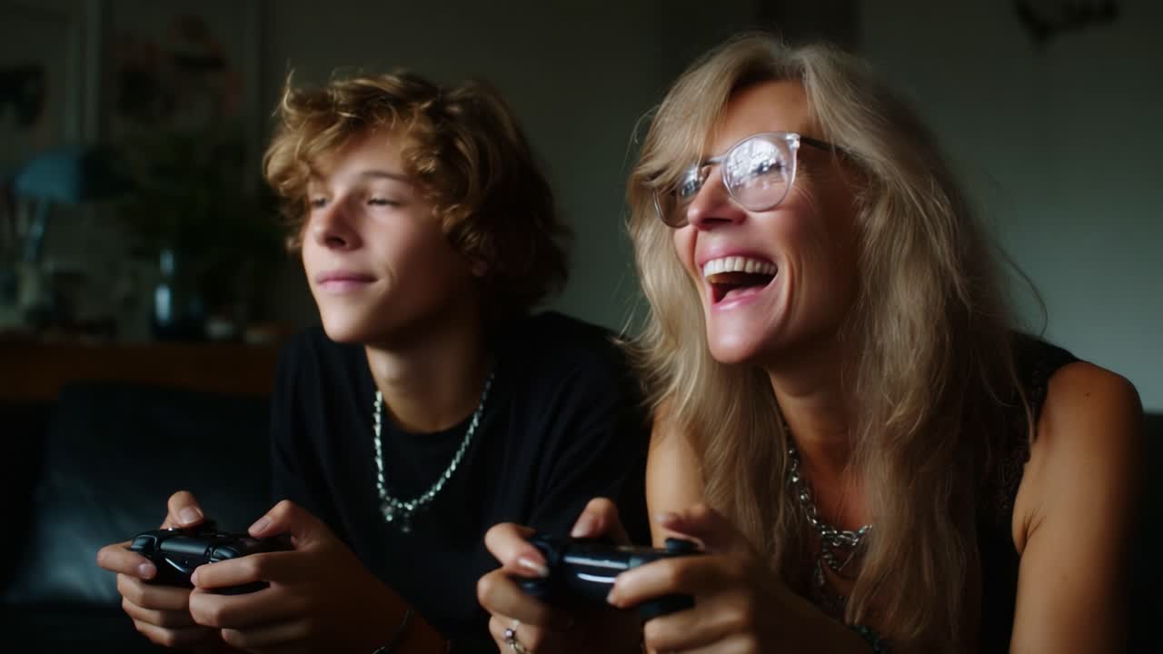 Joyful Gaming Moments: A Dynamic Duo Engaged in an Exciting Video Game Session, Sharing Laughter and Bonding Over Their Favorite Pastime Together at Home