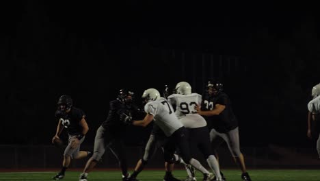 a football player avoids being tackled many times and makes a touchdown