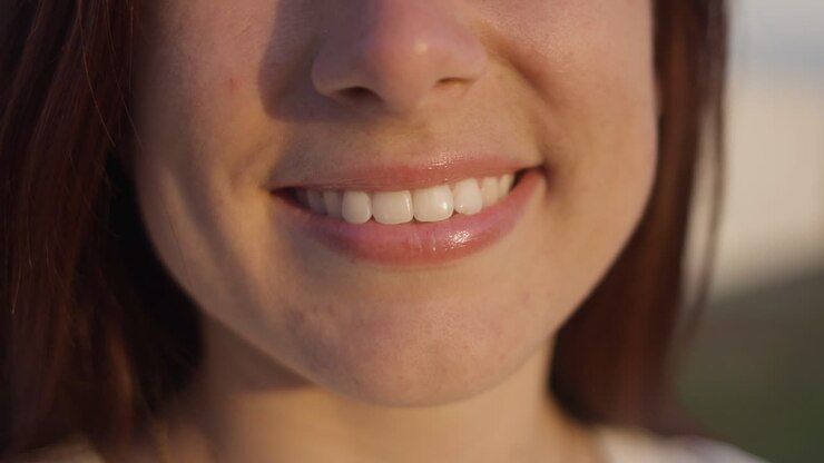 Beautiful smile of young woman.