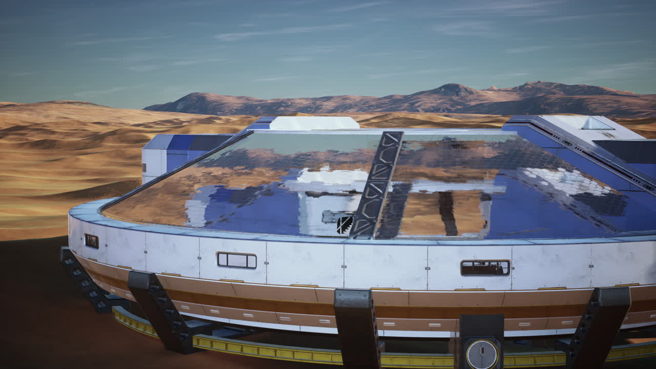 futuristic glass building in desert dunes