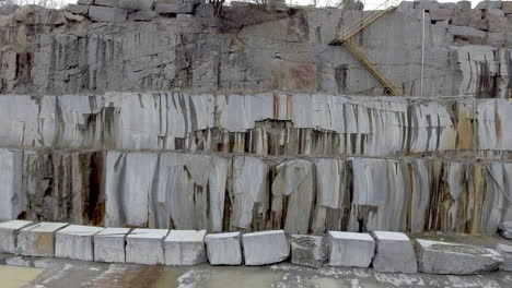 Slow-camera-dolly-of-granite-quarry-stone-slabs