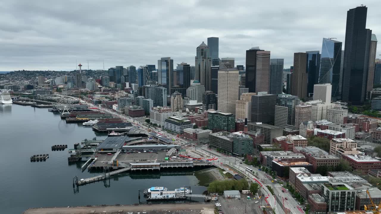 Aerial view of Seattle's waterfront and how it connects to nearby skyscrapers