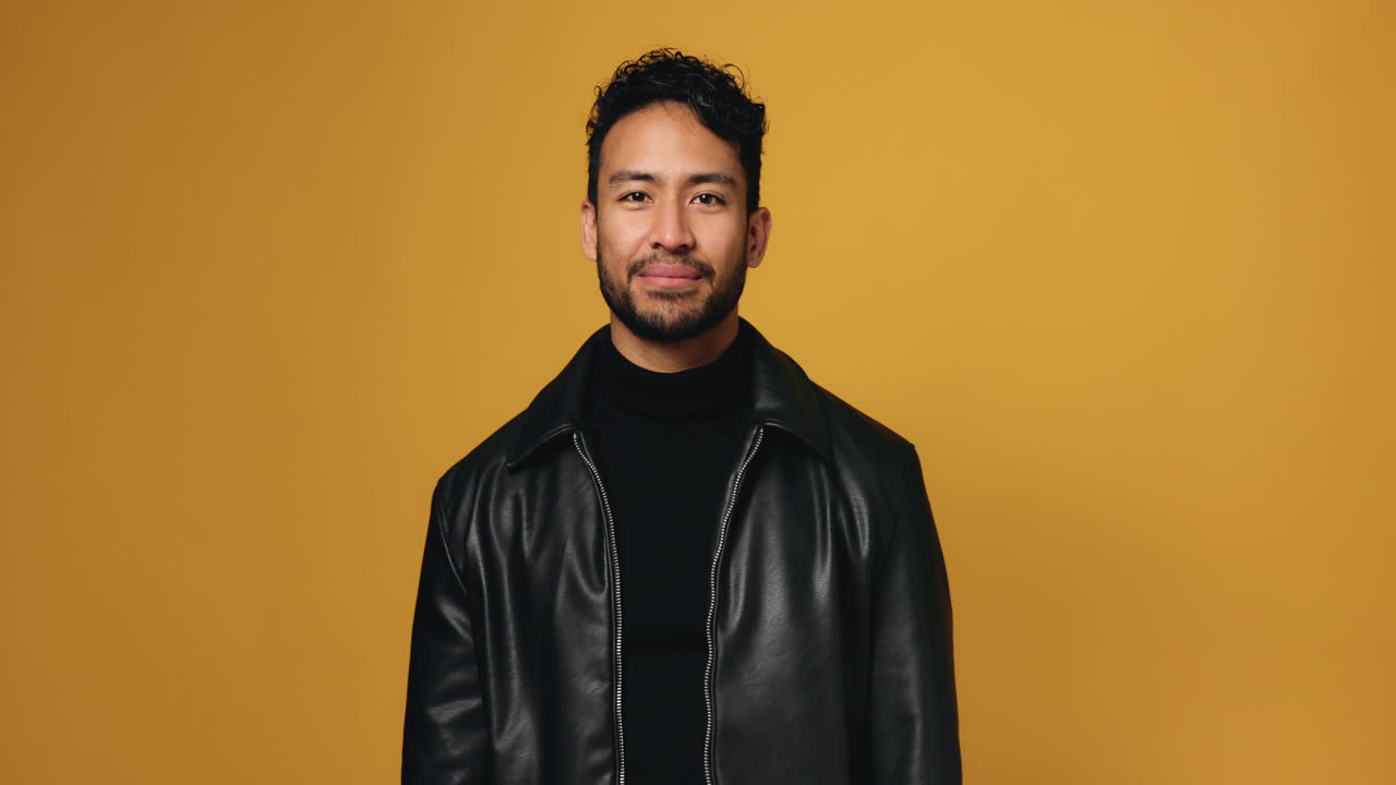 Portrait of a smiling man in a leather jacket