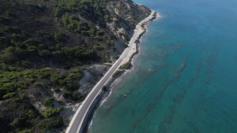 a serene coastal drive along the greek coastline