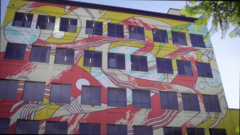 colorful abstract mural on a building facade