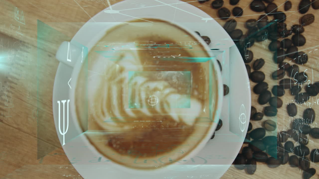 Leaf-pattern latte foam floating in ceramic cup on wooden table, coffee beans scattered around