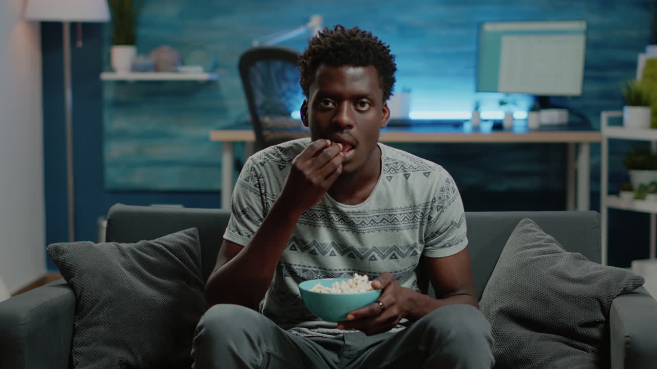 POV of person watching football game on television