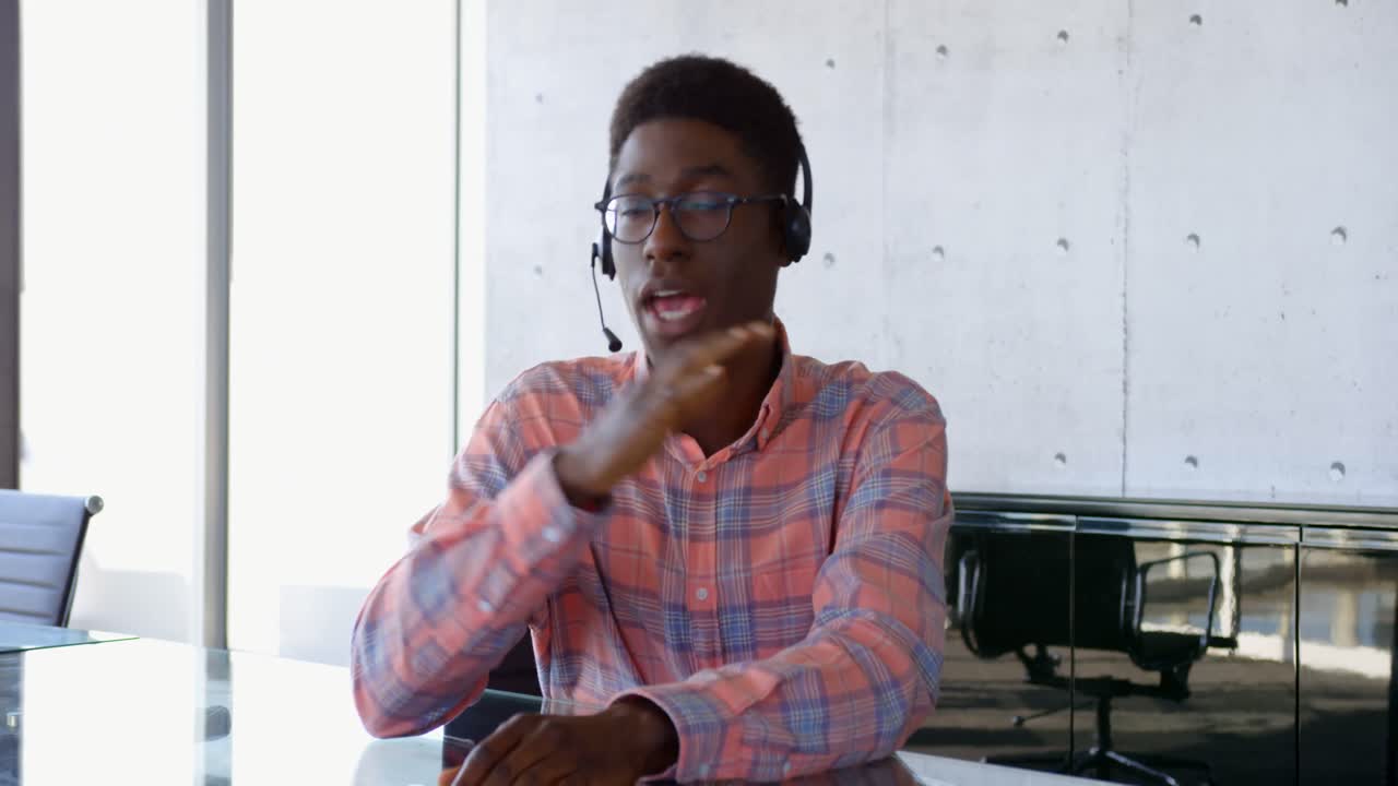 Front view of African American male executive interacting in the office 4k