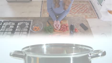 animación de zanahorias cayendo en la olla sobre una mujer caucásica cortando verduras en la cocina