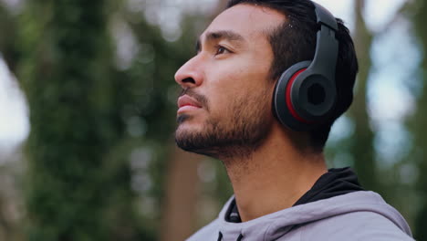 man listening to music outdoors