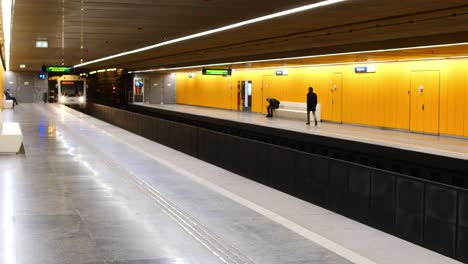 metro 3 arriving to the station in pöttyös utca stop, metro line number 3