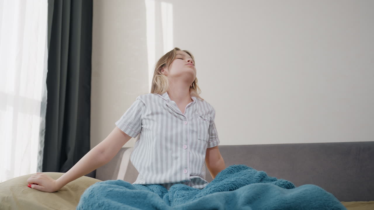 Energetic Morning Stretch, Teen Girl Performs Lively Stretch, Teen Girl Stretches Energetically With Vibrant Morning Light, Young Girl Enthusiastically Stretches Arms At Dawn By Sunny Window