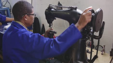 mixed race man working in factory
