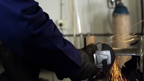 Welder-working-at-work-shop