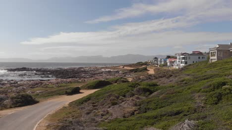 AERIAL:-Sea-view-houses-of-small-South-African-valley-at-the-garden-route