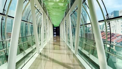 view inside glass bridge of orchardgateway shopping mall in orchard road, singapore