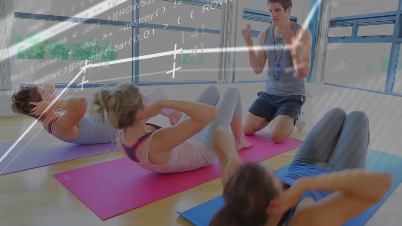 fitness instructor guiding group through crunches on mats in gym, animated heart icon floating