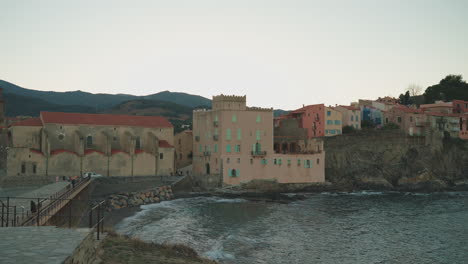 spiaggetta di collioure, église notre-dame backdrop, serene sea - france