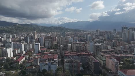 cinematic daytime drone footage of batumi skyline and skyscrapers.