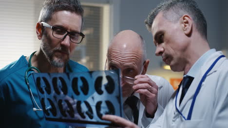 doctors reviewing x-ray images