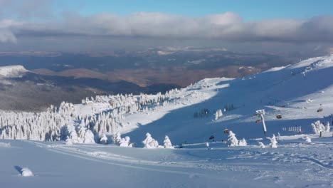 Aerial-reveal-shot-of-a-ski-lift-on-Jahorina-Mountain-in-Bosnia