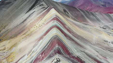 rainbow mountain, peru, pan left to right aerial shot