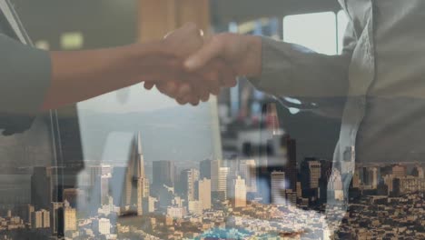 handshake with city in background