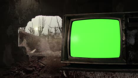 vintage tv set with green screen inside an old demolished building. 4k resolution.