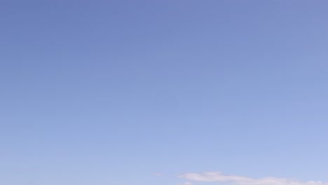 mountains and fields under a clear blue sky